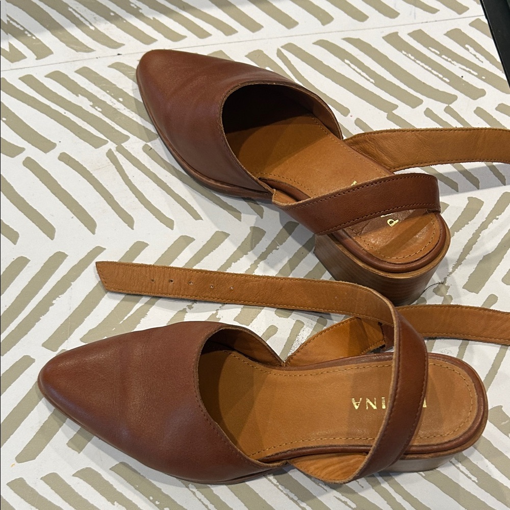 Elegant Brown Leather Mules by [Brand]